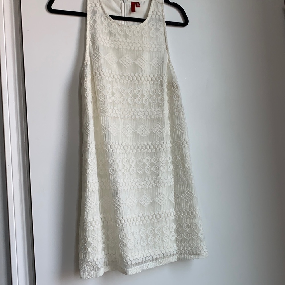 White tank dress with geometric details on overlay